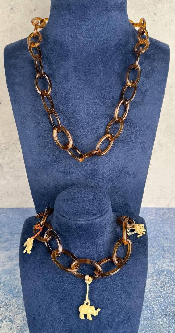 Celluloid Elephant Bracelet and Necklace: Nice grouping.