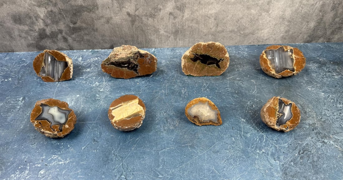 Sliced Montana Thunderegg Geodes: Eight total. 3.8 lbs total weight. Provenance: From the estate of Moosehead Gallery rock shop in Hamilton, Montana.
