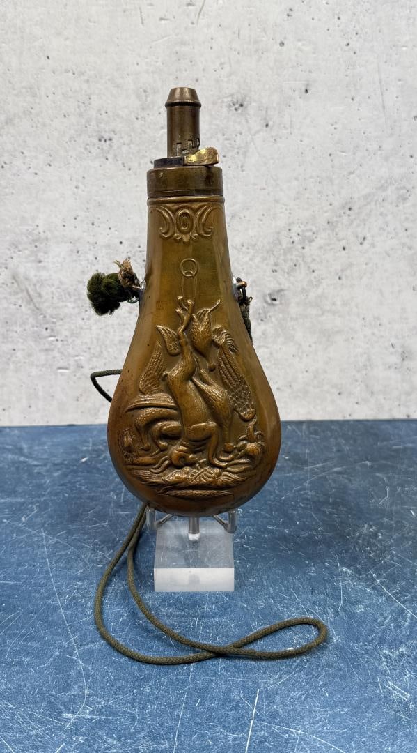 1872 Patent Hanging Game Brass Powder Flask: 7 7/8" by 3 1/4" by 1 3/4". Hanging Game Pattern.