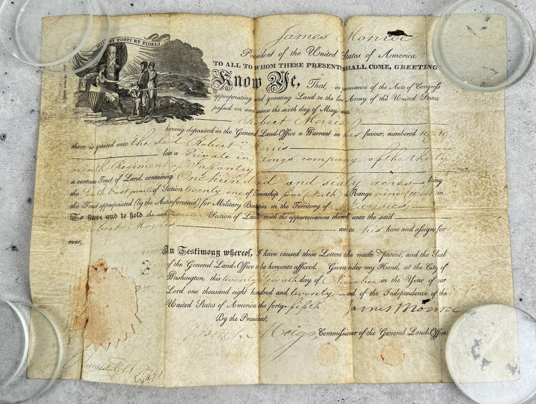 James Monroe Presidential Signed Land Grant: Signed land grant as president, 1820, for military bounty of land in Arkansas. Land given to Private Robert Morris of the 39th Infantry Regiment. 160 total acres. 9 3/4" by 12 1/2".