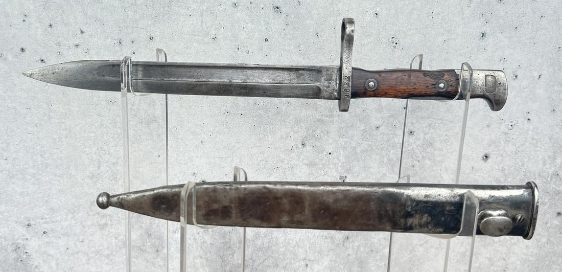 Spanish Model 1893 Mauser Bayonet: Scabbard has a dent.