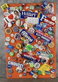 Collection of Political Buttons on Board