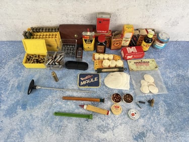Collection of Bullets and Gun Cleaning Supplies