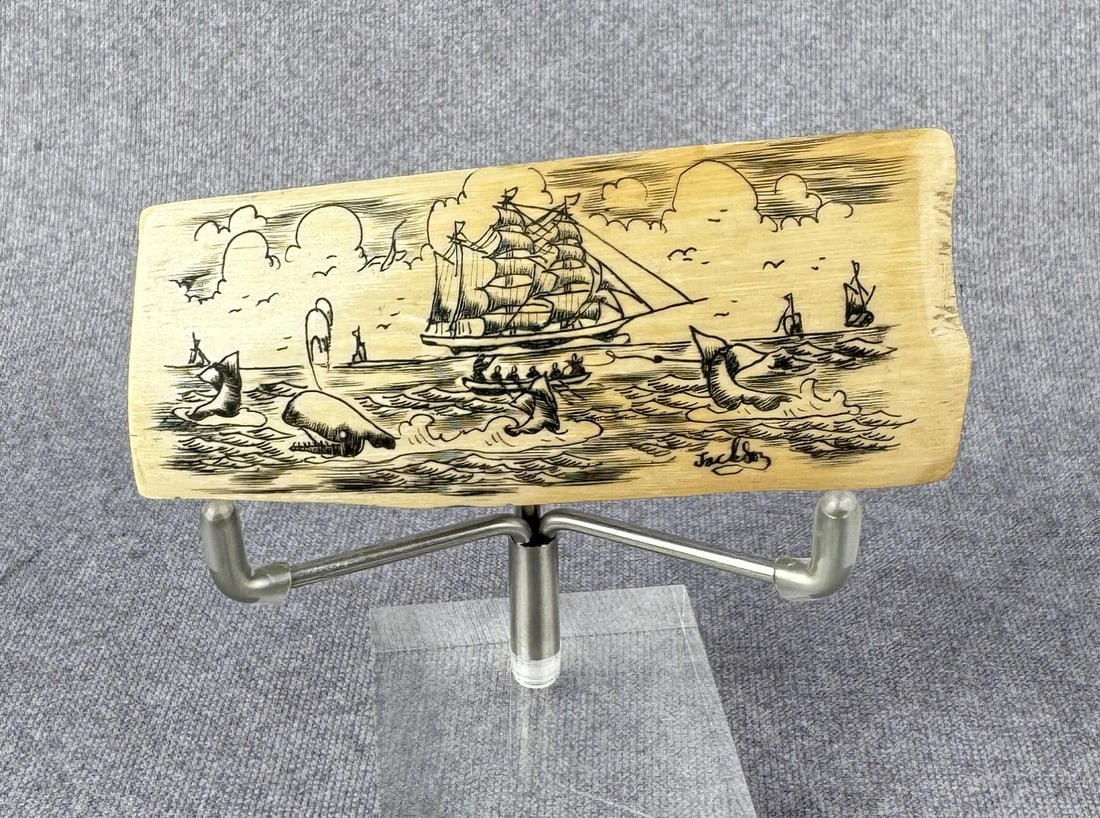 Jackson Scrimshaw Whaling Scene Panel: Scrimshaw Walrus Material. 3 1/2" by 1 1/2". Native made prior to 1972.