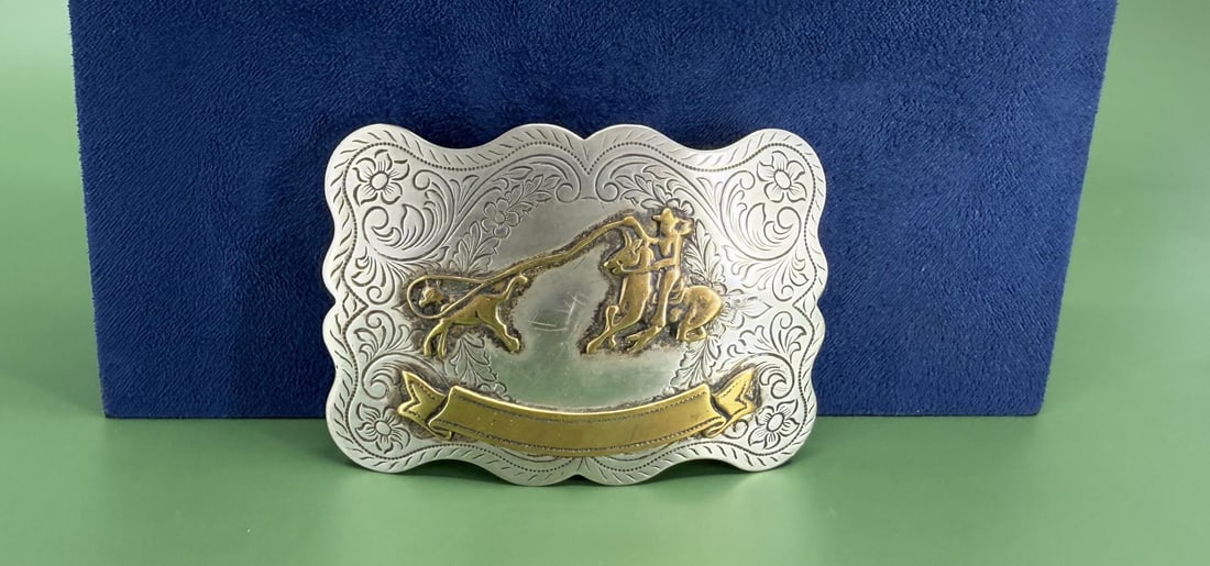 Miller Western Wear Cowboy Belt Buckle: 3 1/2" long.