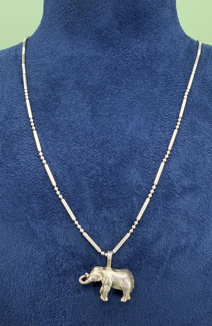 Sterling Silver Trunk Up Elephant Necklace: 12 1/2" closed