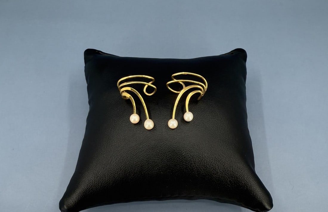 Sterling Silver Freshwater Pearl Ear Charms: 1" long.