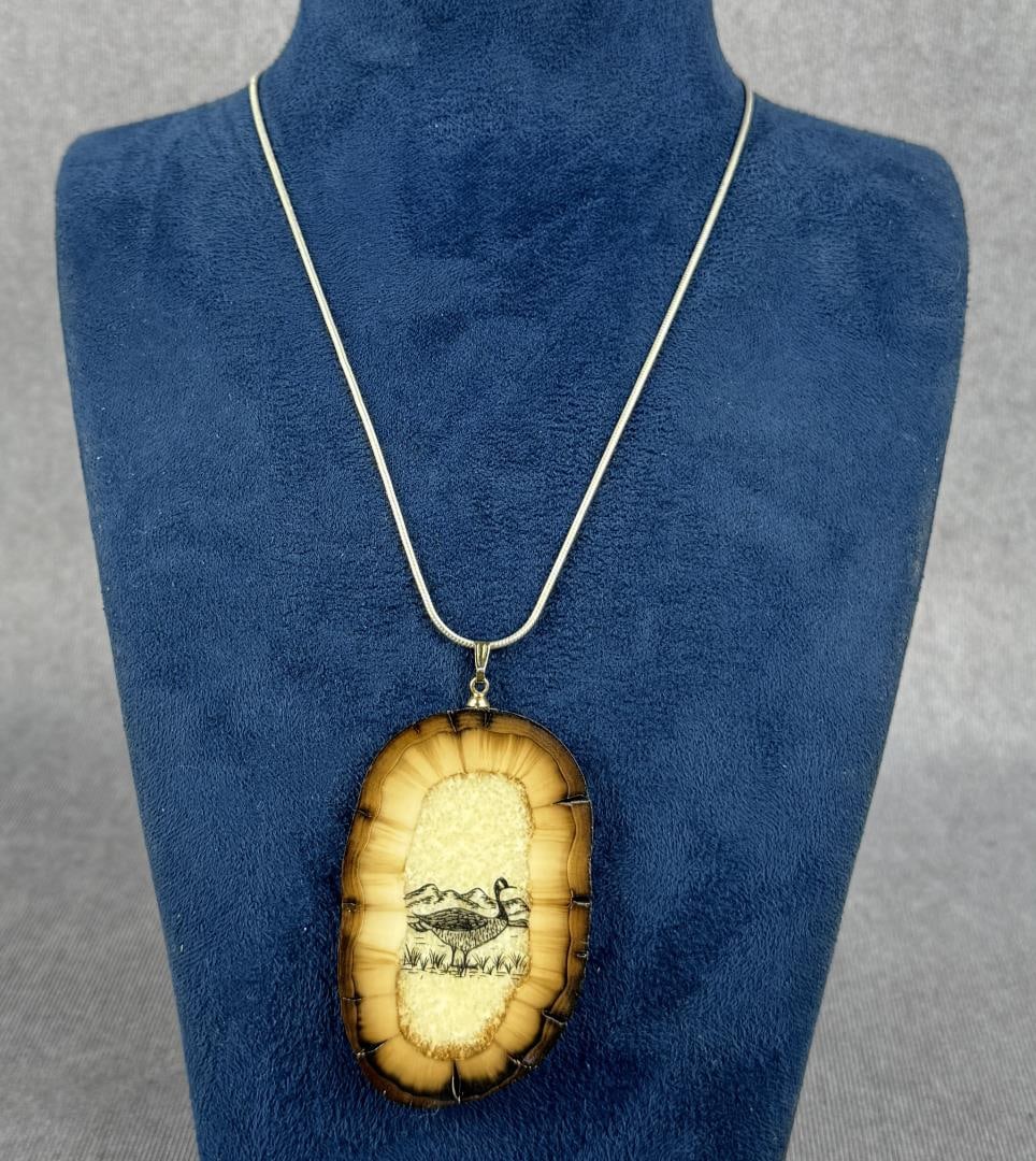 Alaska Eskimo Inuit Scrimshaw Necklace: Fossilized walrus material. 11" long closed. Native made before 1972. This item cannot be shipped to Oregon, California, Hawaii, New York, New Jersey, Internationally, or any other state that prohibit