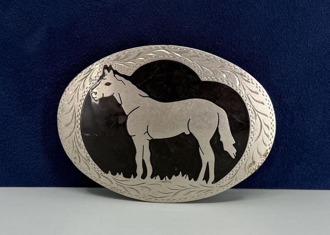 Inlaid Cowboy Belt Buckle: 3 3/4" long.