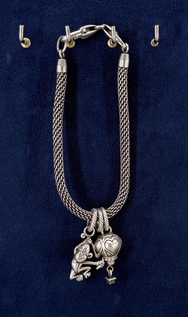 Brighton Charm Bracelet: 8 1/2" long open.