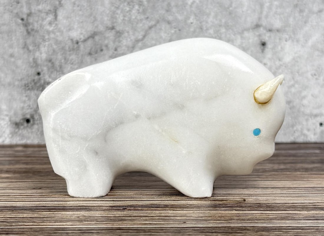 Lynn Quam Zuni Carved Buffalo Fetish: 2 3/4" by 1 3/4" by 3/4".