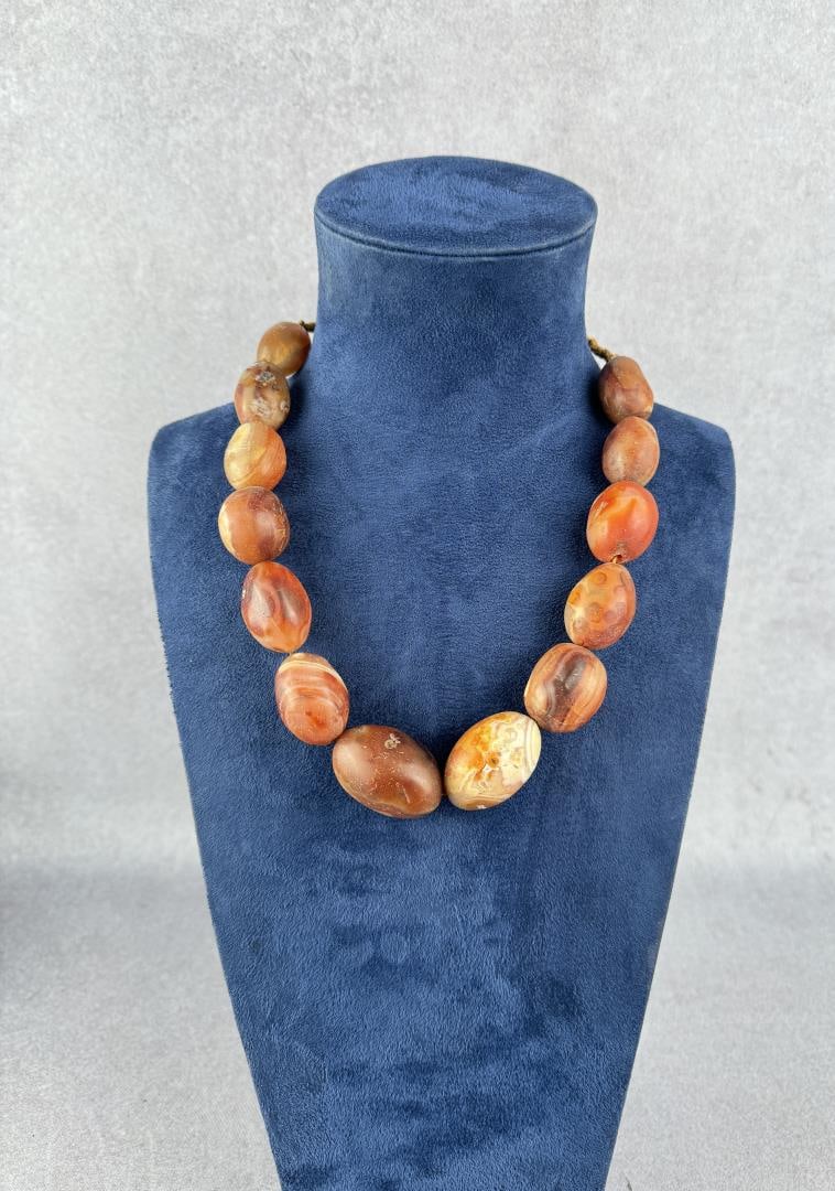 Tibetan Carved Carnelian Pema Raka Necklace: 11 1/2" long.