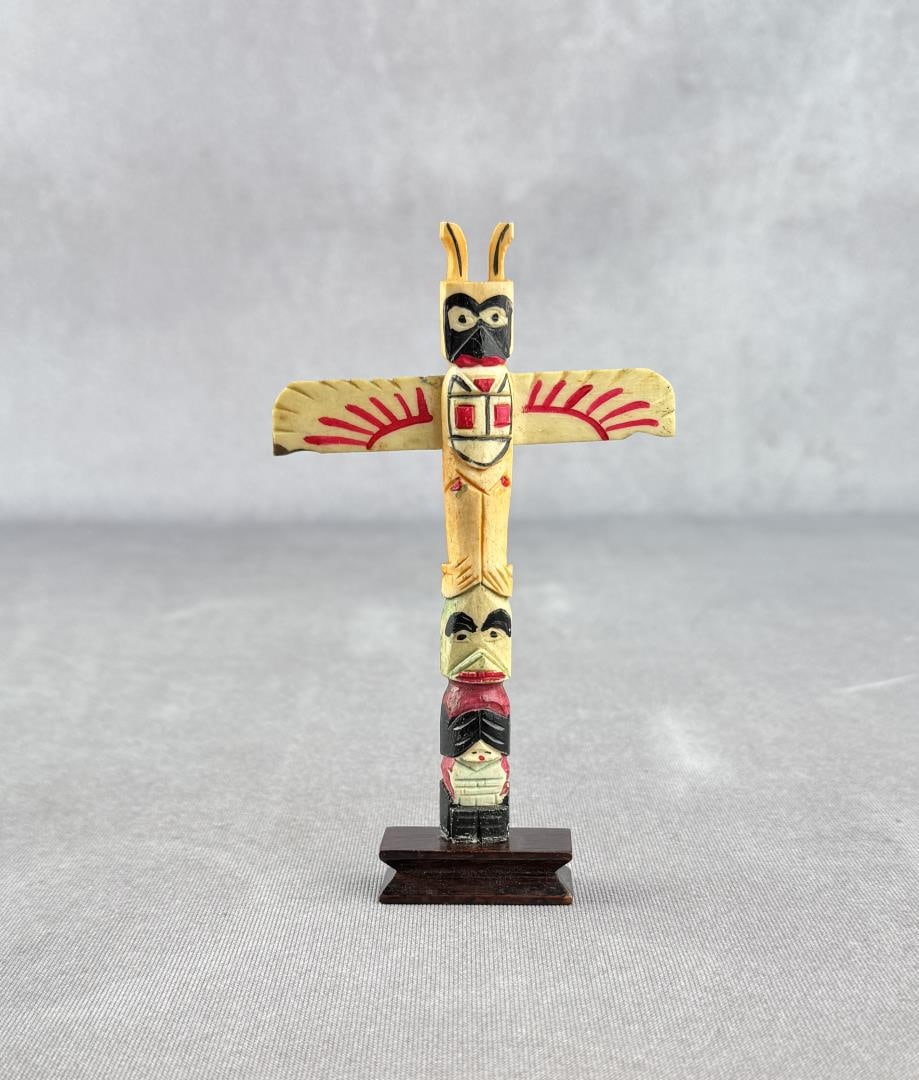 1950s Northwest Coast Carved Bone Totem Pole: 5 1/2" tall.
