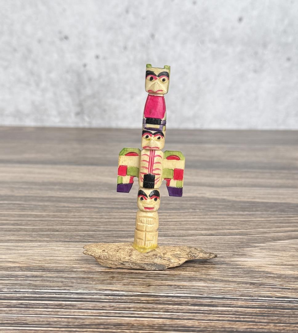 1950s Northwest Coast Carved Bone Totem Pole: 4 3/8" tall.