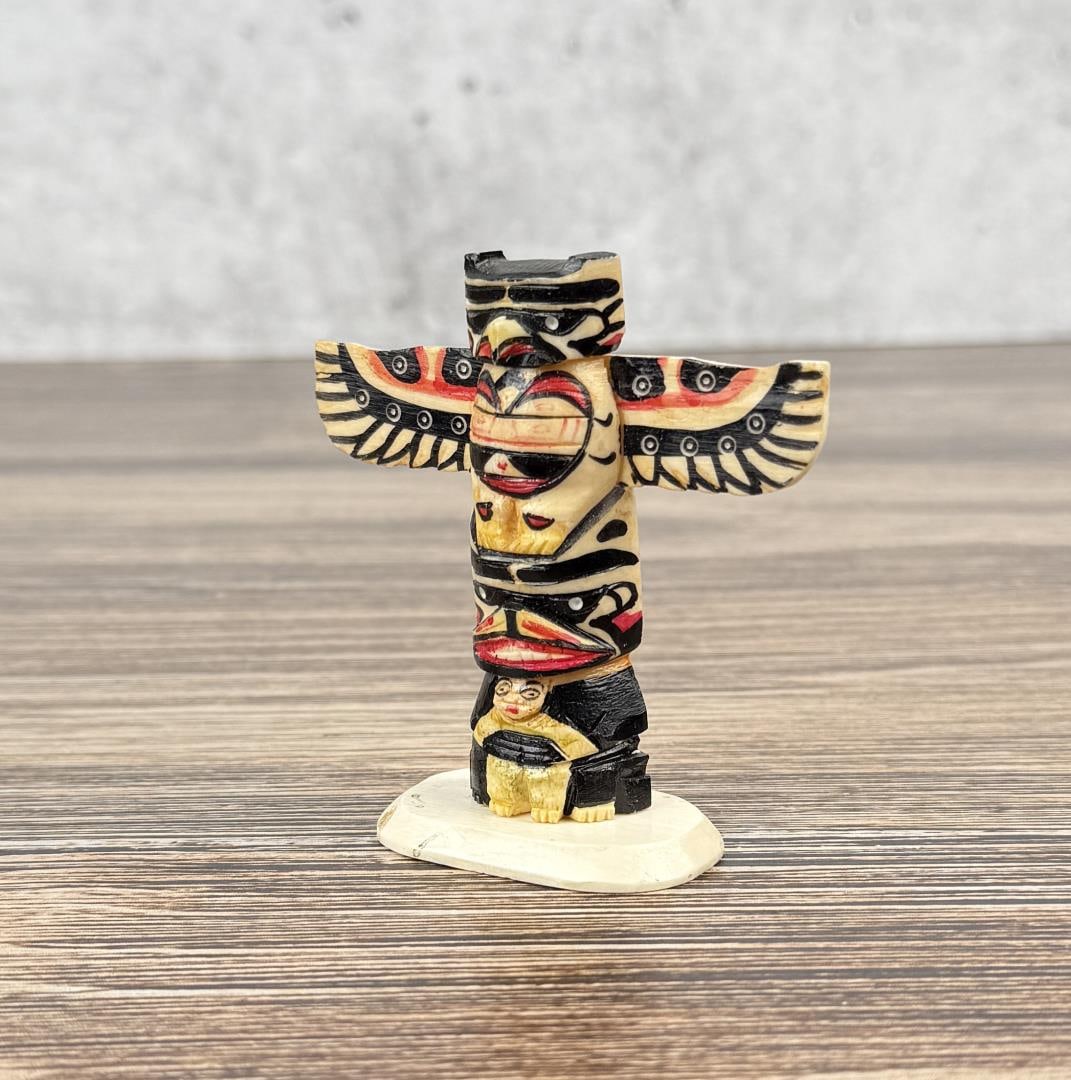 1950s Northwest Coast Carved Bone Totem Pole: 3 1/8" tall.