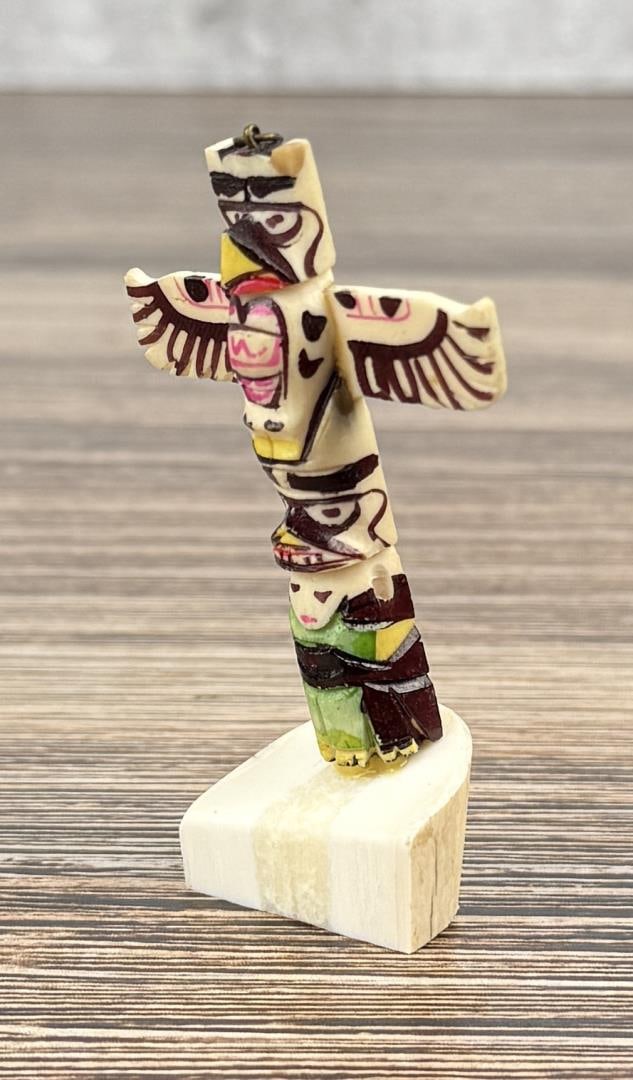 1950s Northwest Coast Carved Bone Totem Pole: 3" tall.