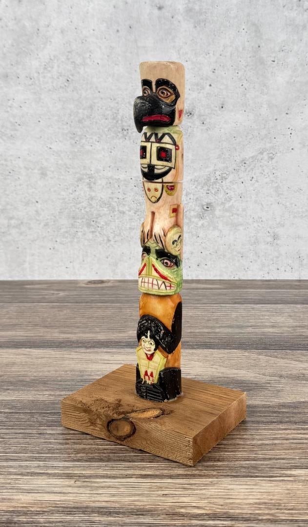 1950s Northwest Coast Carved Bone Totem Pole: 10 7/8" tall.