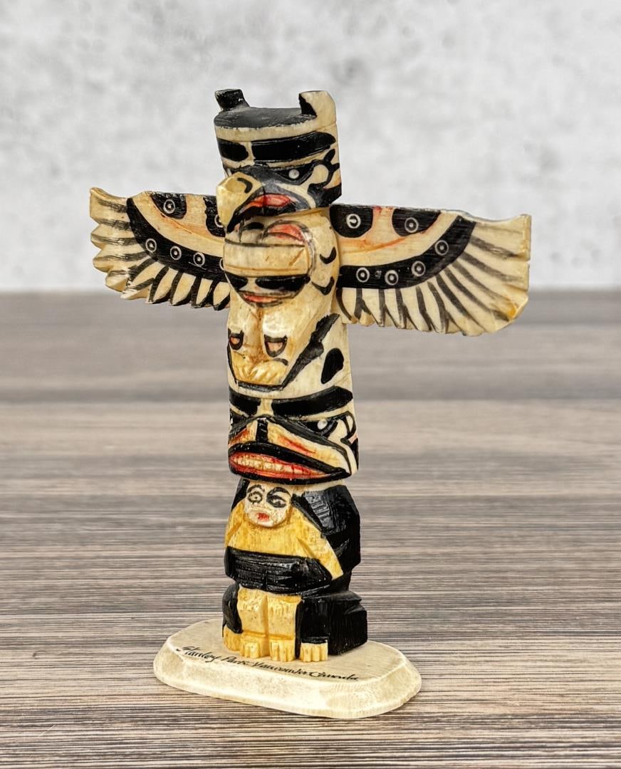 1950s Northwest Coast Carved Bone Totem Pole: Stanley Park Vancouver Canada. 4 1/8" tall.