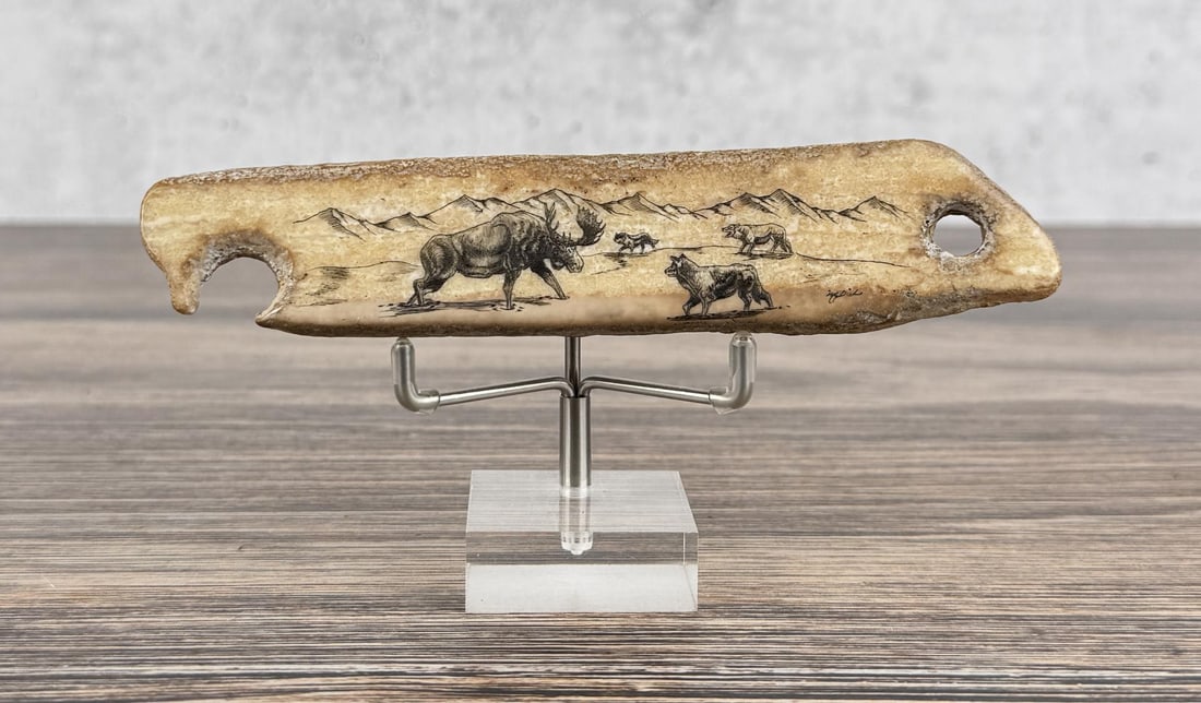 Alaskan Inuit Eskimo Scrimshaw Net Weight: 6 3/8" long. Carved walrus material. Native made prior to 1972. This item cannot be shipped to Oregon, California, Hawaii, New York, New Jersey, Internationally, or any other state that prohibits.