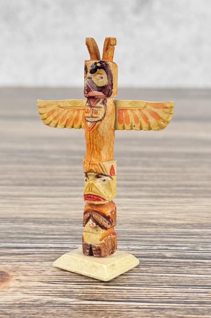 1950s Northwest Coast Carved Bone Totem Pole: 3" tall.