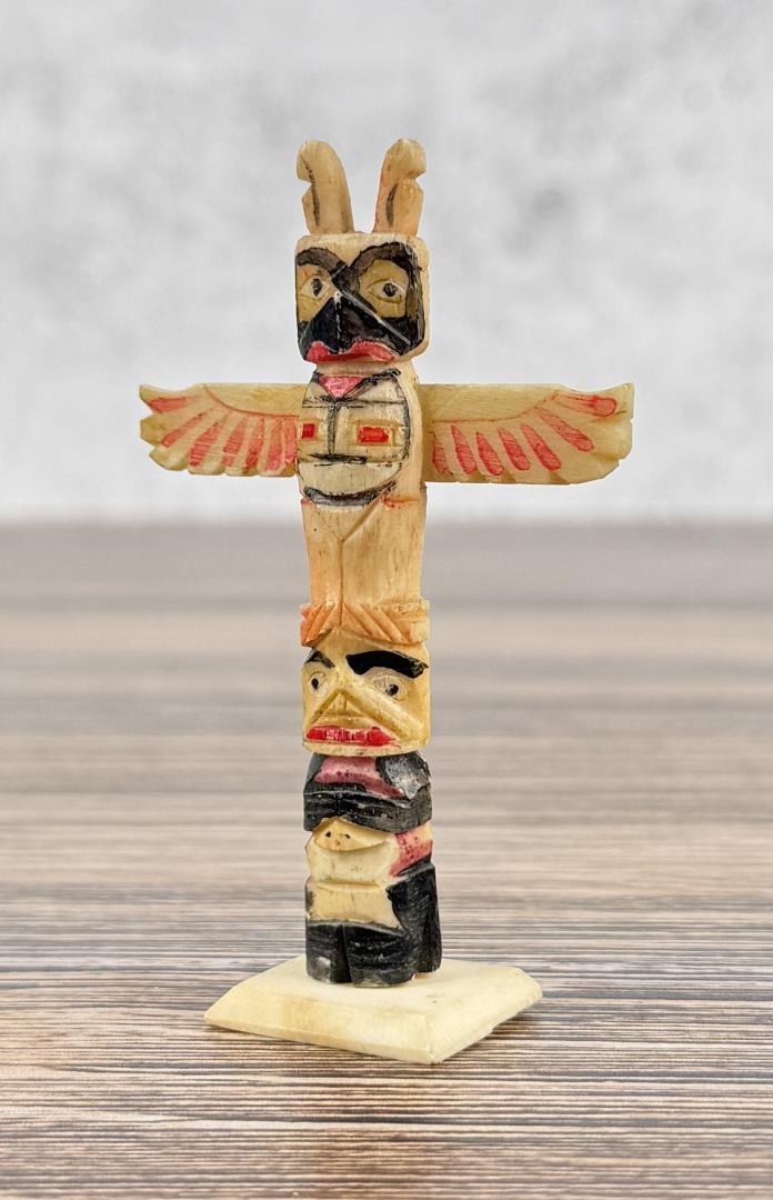 1950s Northwest Coast Carved Bone Totem Pole: 3 1/8" tall.