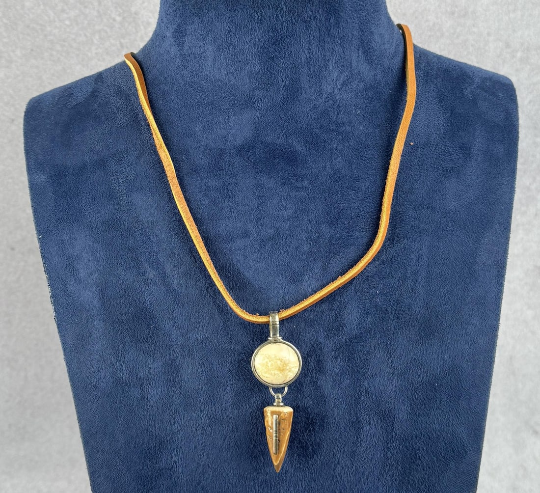 Alaskan Inuit Eskimo Necklace: 12 5/8" long. Carved walrus material. Native made prior to 1972. This item cannot be shipped to Oregon, California, Hawaii, New York, New Jersey, Internationally, or any other state that prohibits.