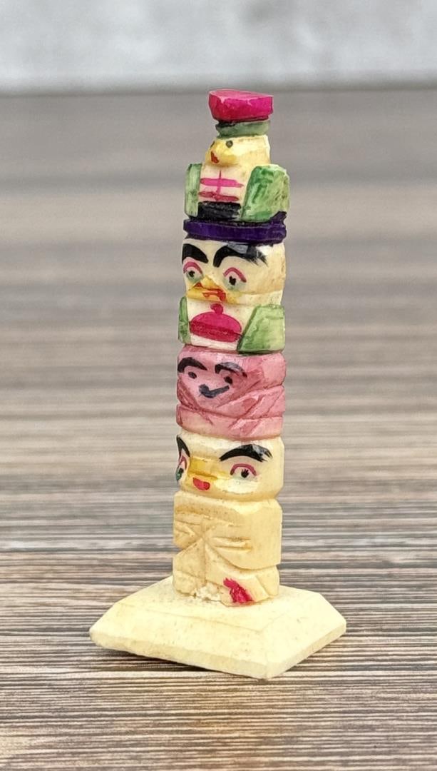 1950s Northwest Coast Carved Bone Totem Pole: 2 1/8" tall.