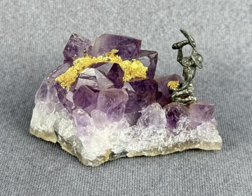 Prospector Miner on Amethyst Crystal