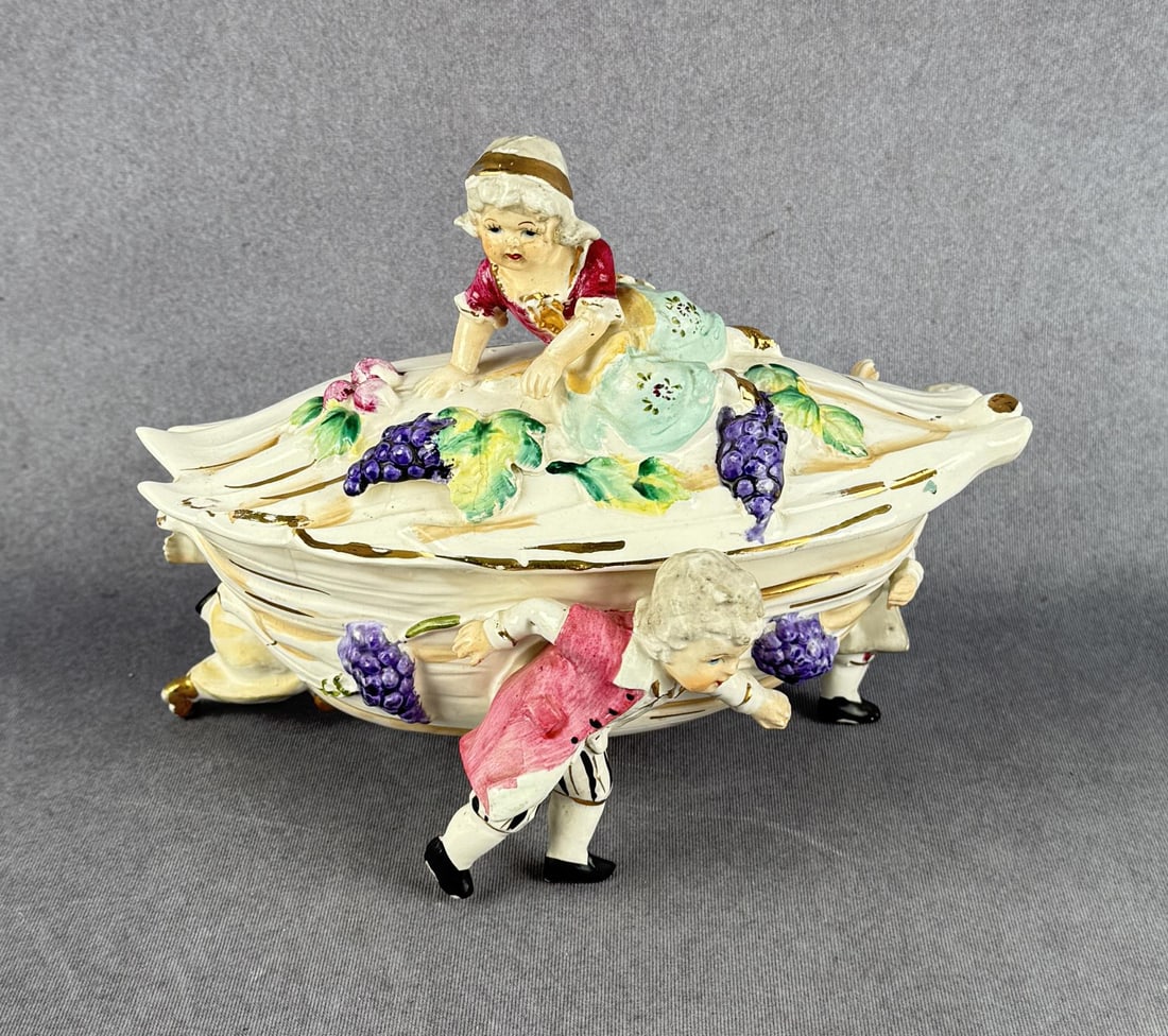 Capodimonte Covered Box: 9 1/4" by 7" by 5 1/4". Areas of damage as shown.