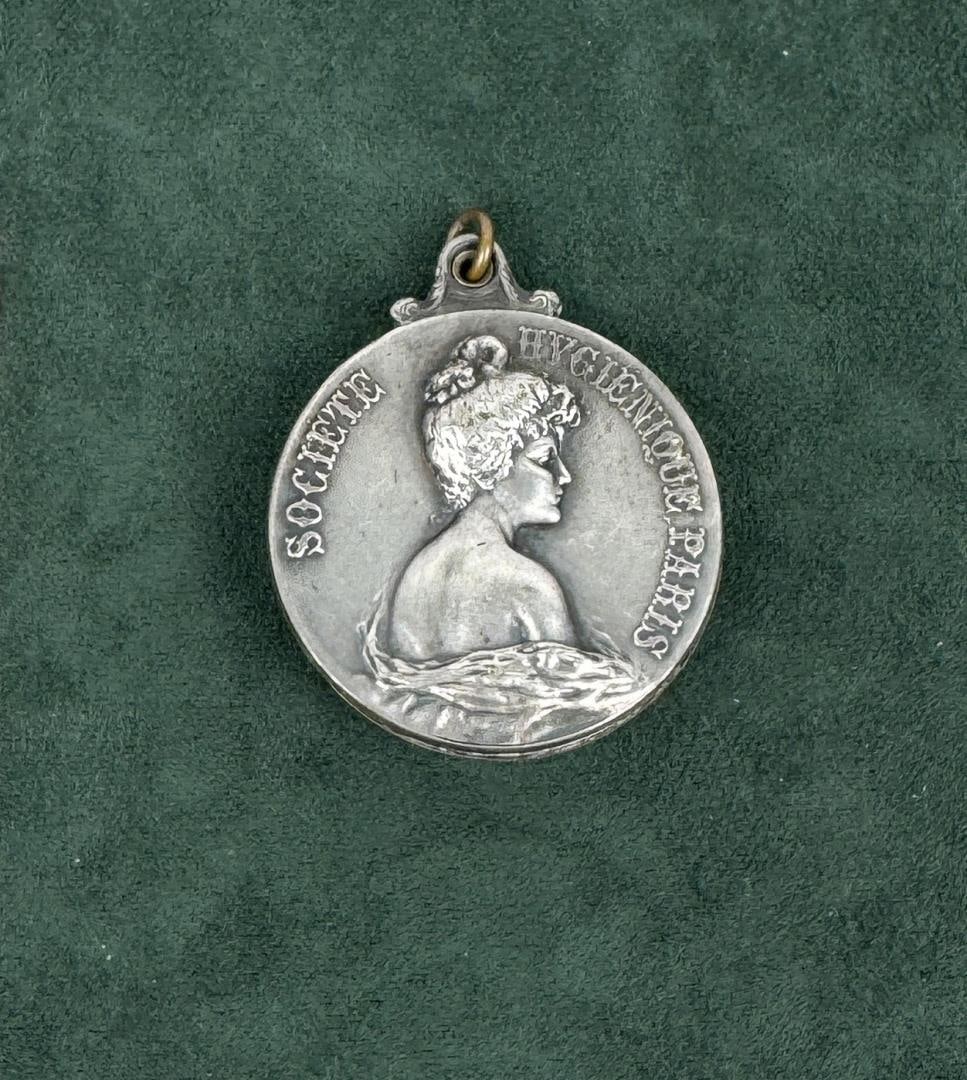 Societe Hygienique Paris Folding Pocket Mirror: 1 1/2" diameter.