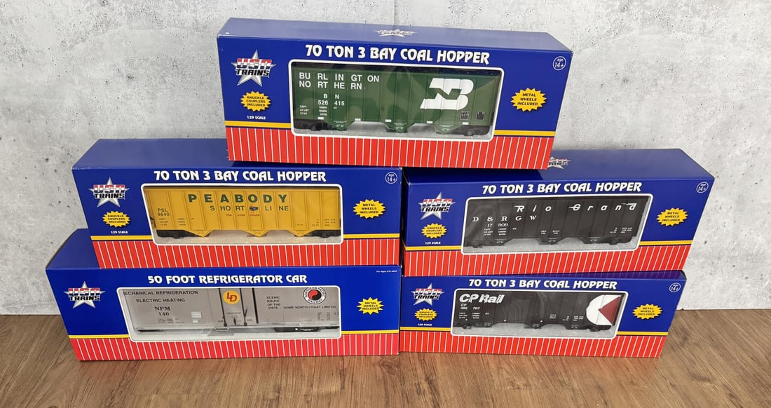 Group Of USA Trains G Scale Rolling Stock Cars: Five total. Four coal cars and a refrigerator car.