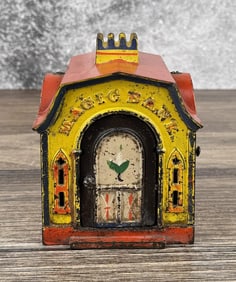 J.E. Stevens Mechanical Cast Iron Magic Bank