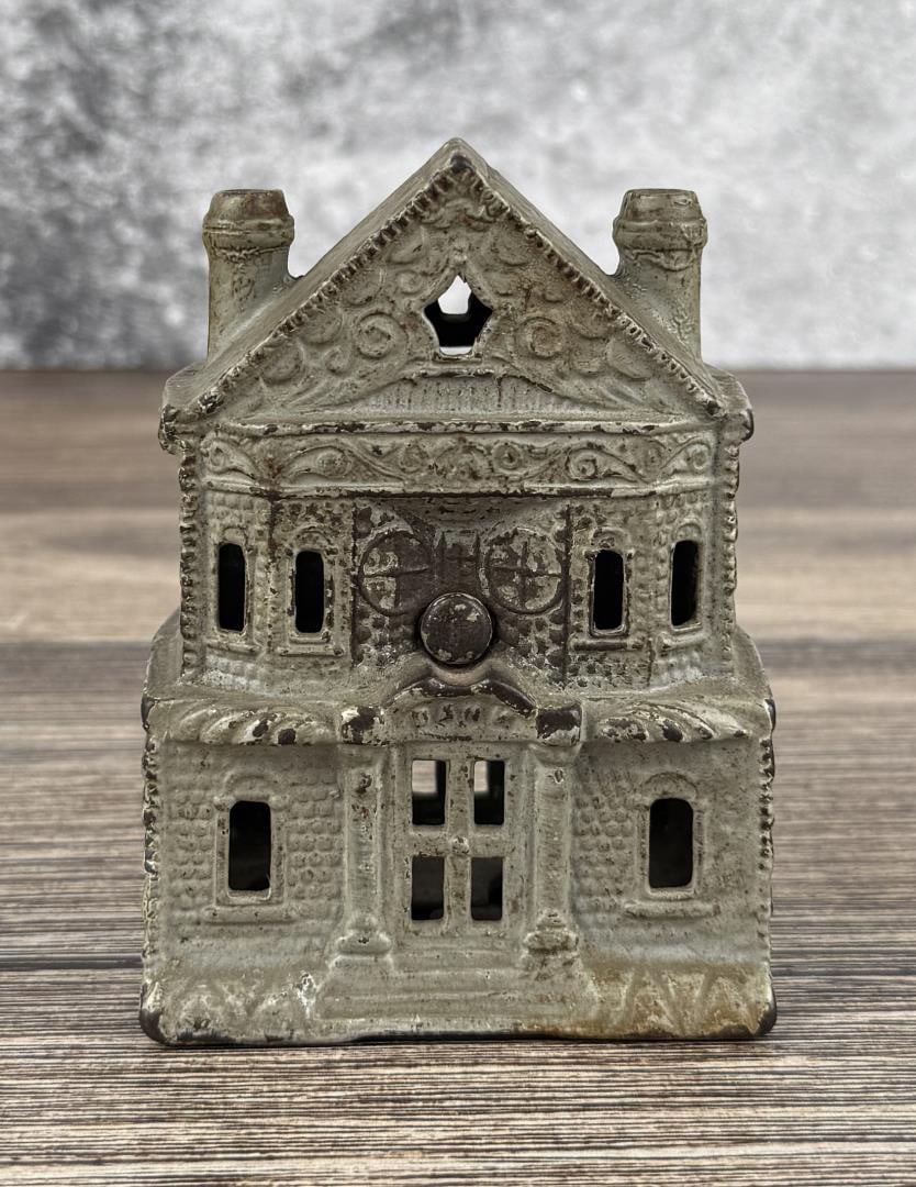 J&E Stevens Victorian House Cast Iron Bank: Still bank Measures 4 3/8" by 3 1/4" by 2 1/2"