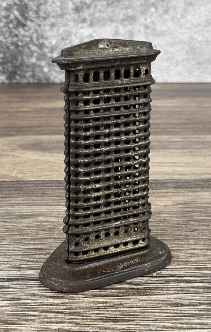 Kenton Flat Iron Building Cast Iron Bank: Still Bank measures 5 3/8" by 3 3/8" by 2 7/8"