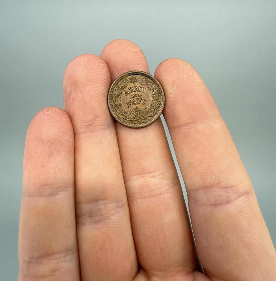 1863 Civil War Army Navy Merchant Trade Token: And spelled out variant.