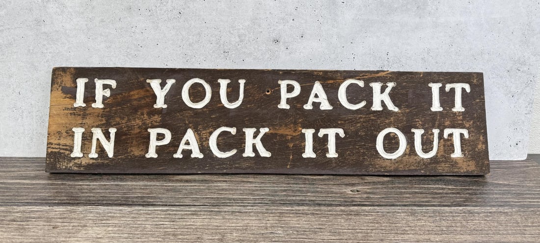 Montana USFS US Forest Service Pack it Out Sign: If you Pack it in Pack it Out. Nice original sign. 7 1/4" by 30".