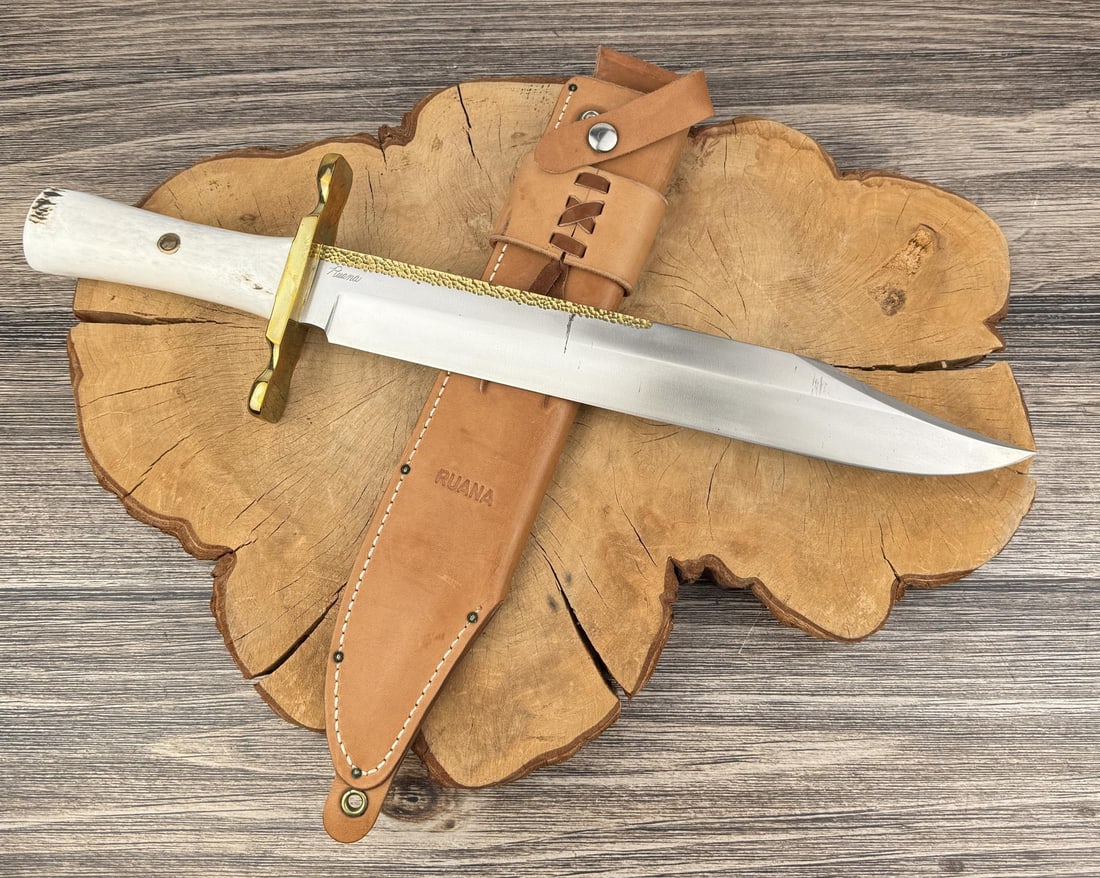 Ruana Bonner Montana 33B Bowie Knife: Never used or carried. A couple minor carbon spots on the blade from storage, could be buffed out. 19 1/2" long. As good as it gets.