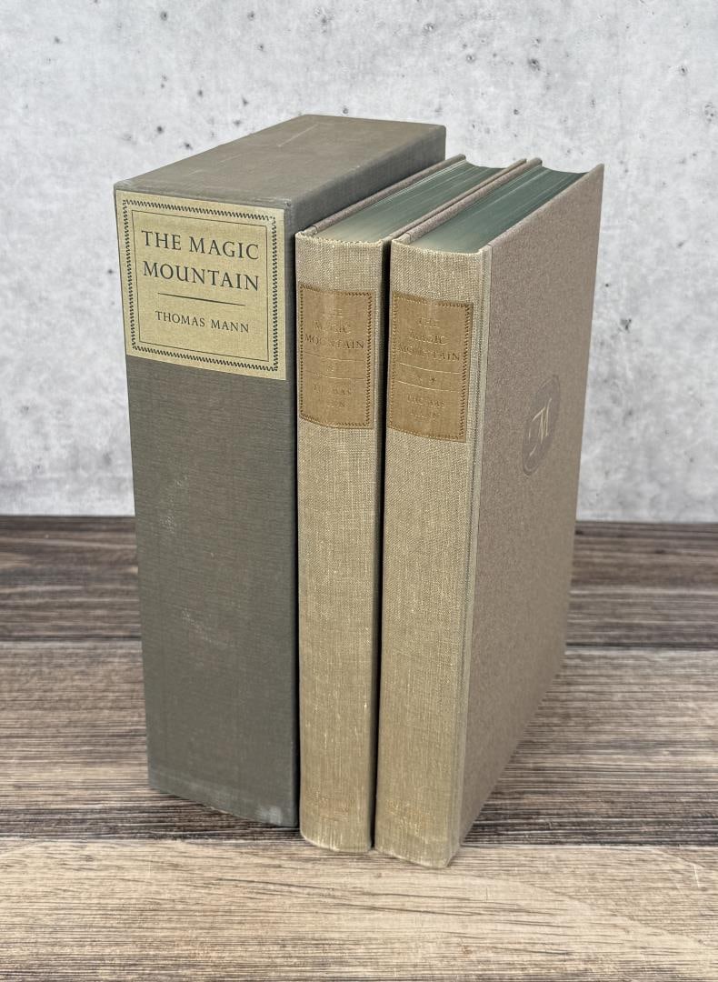 The Magic Mountain Volume 1 & 2 Illustrator Signed: Thomas Mann, 1962. Limited Editions Club 129 of 1500. Illustrator signed. Provenance- from the estate of former Ford Motor Company CEO Donald E. Petersen.
