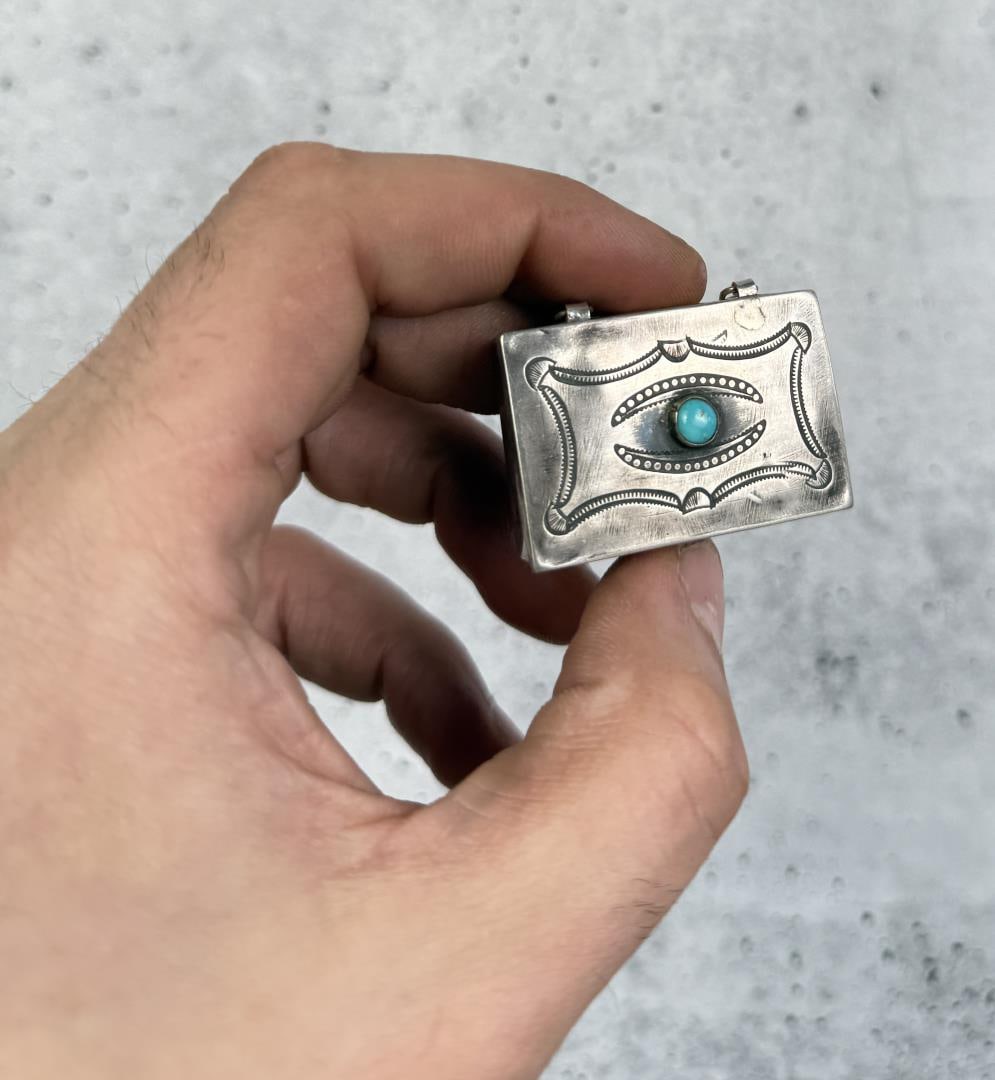 Navajo Sterling Silver Turquoise Pill Box: 1 5/8" by 1 1/4" by 1/2". 19.1 grams.