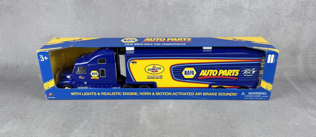 2016 Napa Race Car Transporter Semi Truck Toy: New in box.