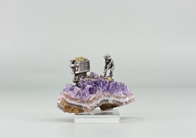 Prospector Miner on Amethyst Crystal
