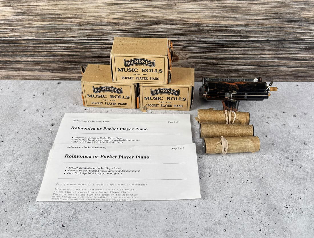 Rolmonica Pocket Player Piano: Comes with Music Rolls.