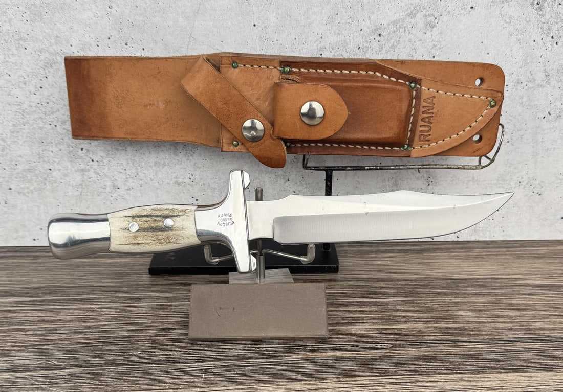 Ruana Bonner Montana Mountain Man Bowie Knife: Deluxe version with the sharpening stone. Only made in 1986. Never used or carried. 11" long.