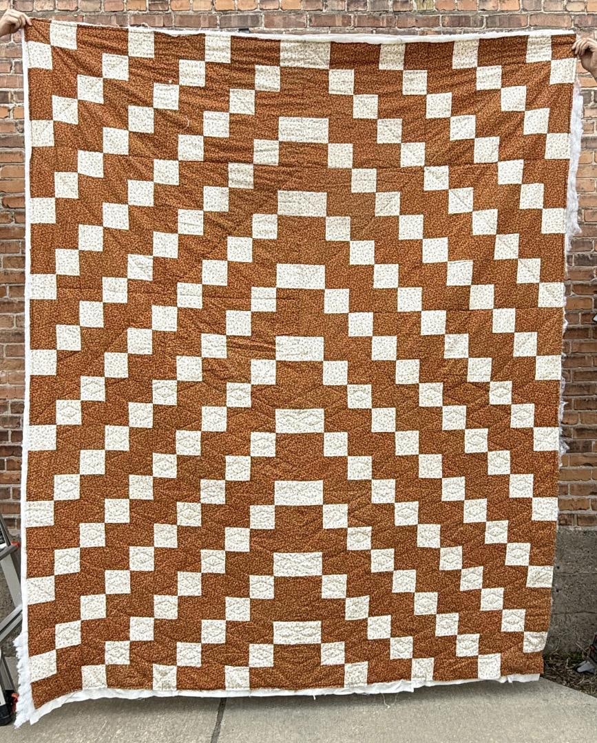 Antique Quilt: 84" by 108. Some condition issues.