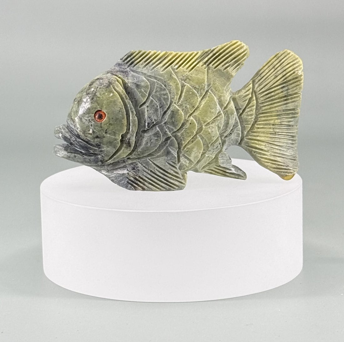Carved Stone Fish Fetish: 3 1/4" by 1 7/8" by 7/8".