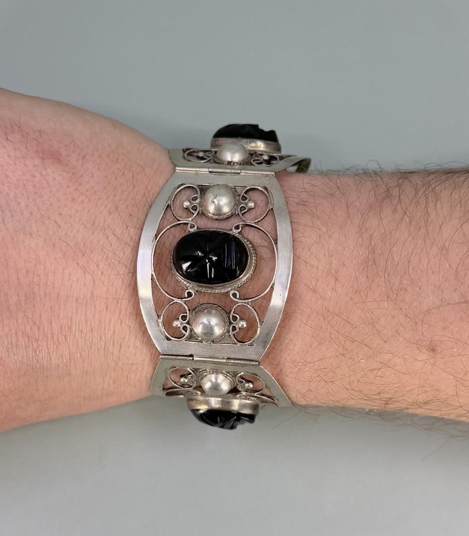 Taxco Mexico Sterling Silver Aztec Bracelet: 40 grams. 7 1/4" long when open.