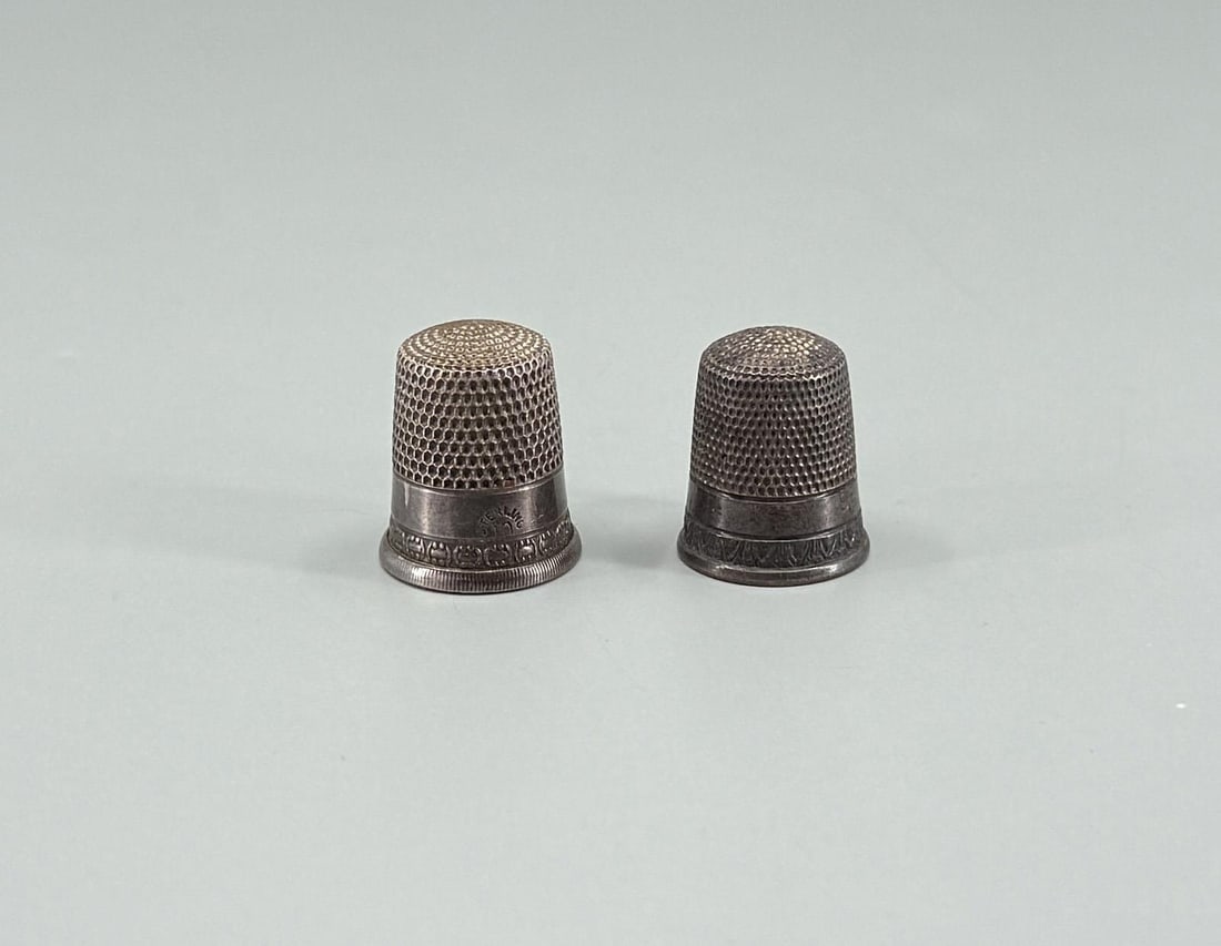 Antique Sterling Silver Thimbles: Nice grouping of two thimbles. 3/4" tall by 5/8".