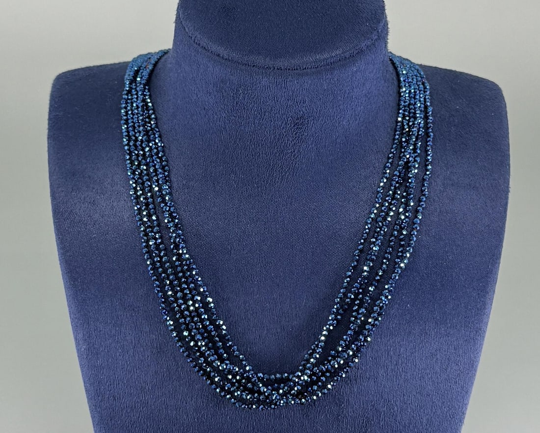 Blue Spinel Torsade Beaded Necklace: Sterling Silver clasp. 8 1/2" long.