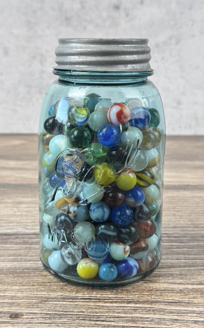 Jar of Vintage Marbles: Nice grouping. Jar Stands 6 7/8" tall.