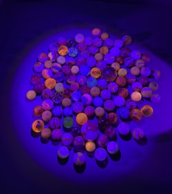 Collection of Vintage Cadmium Glass Marbles